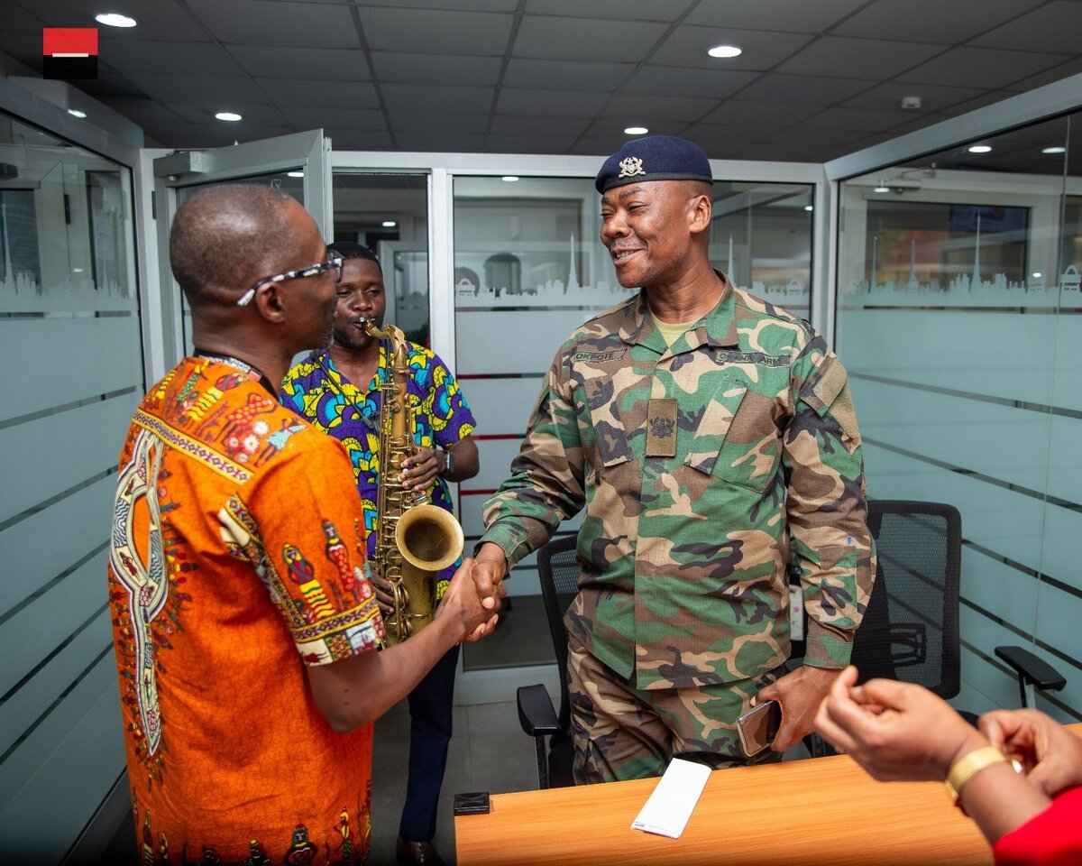 Fig 2. Deputy Managing Director, Support, Mr. Kwame Abbey with a customer at the Accra Main branch 