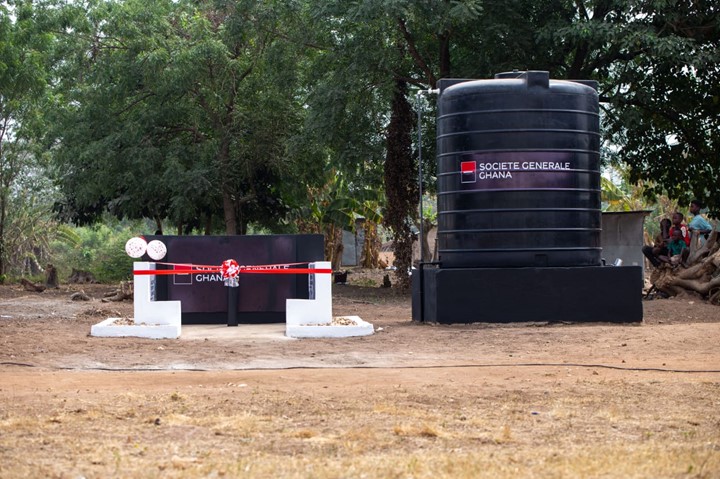 Newly constructed borehole and water tank provided to the Kpenoe Traditional Area. 